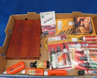 Lot 272. Gun maintenance items, stun gun, and pepper spray