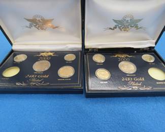 Lot 283. Two 2000 24kt gold-plated coin sets, missing one quarter and one nickel