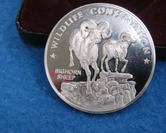 Lot 337. 1972 Postmasters of America Big Horn coin. 25.19 grams of sterling