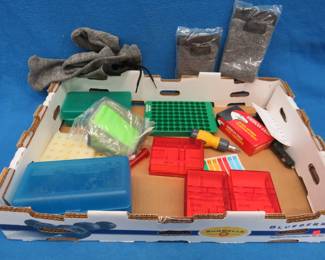 Lot 75. Reloading blocks, empty die boxes, 38 super auto (+P) case for reloading, and more