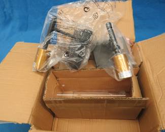 Lot 396. NIB sconce light set and a vanity light