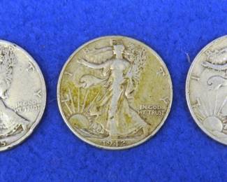 Lot 128. Three Walking Liberty half dollars: 1935, 1942, 1945 S