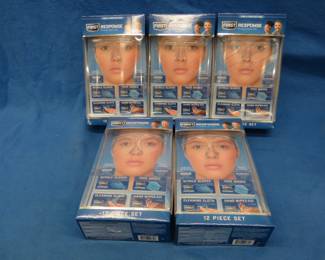 Lot 393. Five new First Response 12-piece Protection kits. Kits include Gloves, masks, hand wipes, face shield, and cleaning cloths