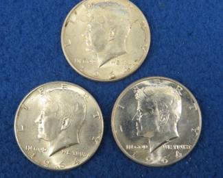 Lot 304. Three 1964 Kennedy half dollars