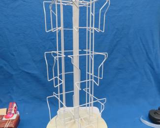 Lot 35. Retail display rack. Base has a crack