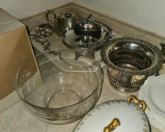 Silver bowls and creamer, glass mixing bowl, covered vegetable bowl