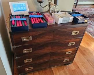 wooden dresser, electric oil style lamp, box of taper candles