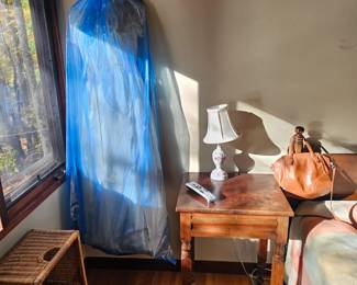 Old Vintage Wedding Dress... Keeping it covered for preservation, wooden baskets, Side wood table, small desk or side table lamp, handbag