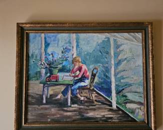 Framed painting of a young boy reading