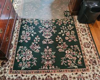 Oriental Emerald green fringed rug, Wooden desk, Wooden chest of draws