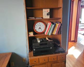 Sony reciever, clock, Wooden book shelf with covered doors