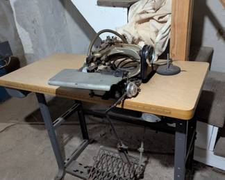 Overlock machine located in the basement. Untested. Very heavy, bring help.