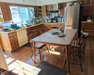 Enter through the back to find a kitchen packed with cookware, gadgets & more.