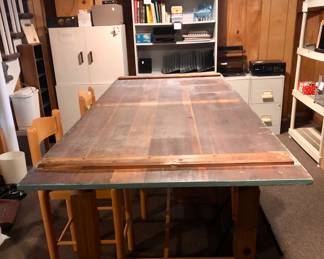 Massive work table! It's about counter height. Great for your next project. I believe the owner did some photography and sold some. We have ALL SIZES of mats & mat material. Frames & glass. This is perfect for your studio or shop!