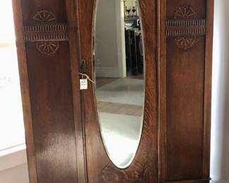 This beauty not only doubles as a closet, it is a show piece! The beautiful oval full length mirror makes a small room look & feel bigger. It measures 75" tall by 42" wide & 17.5 deep. A beautiful piece of furniture. Multipurpose... hang clothing & coats in Foyer... has removal shelves to use as a linen closet...drawer underneath is nice & deep.