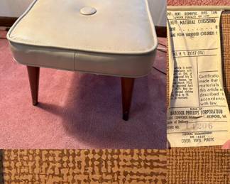 MCM footstool or ottoman with tapered wooden legs and beige vinyl upholstery by Babcock Phillips