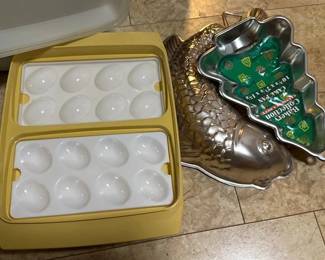 TWO DEVIL EGG CARRIERS AND BAKING MOLDS