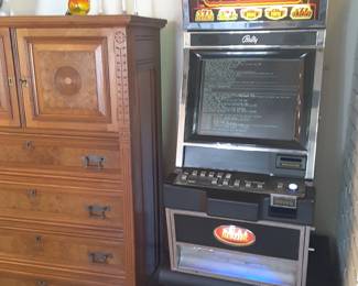 This is a vintage authentic slot machine from Las Vegas..has been refurbished, but is currently not in working condition. I don't know if it is something simple or complicated to get it back and working order.