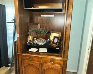 Large armoire with pocket doors