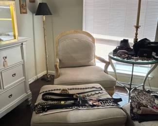 There are a pair of these chairs with an ottoman