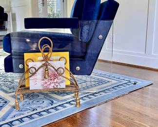 Vintage brass neoclassical magazine rack, attributed to Maison Jansen, $350