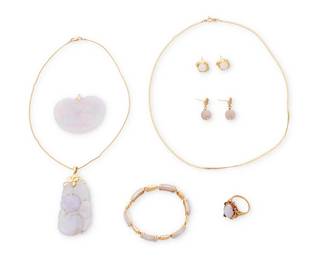 1103
A Group of Gold and Lavender Jade Jewelry
Including two chains, two pendants, two pairs of earrings, a bracelet and a ring all featuring carved and oval cabochon lavender jade
8 pieces
Chains: 14 and 18 in., Pendants: 1 5/8 x 1 7/8 in. and 2 1/2 x 1 1/8 in., Earrings: 1/2 - 1 in., Bracelet: 7 in., Ring: 8
80.8 grams gross
Estimate: $800 - $1,200