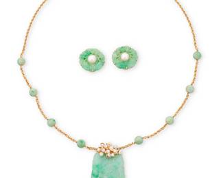1105
A 14K Gold, Jade and Cultured Pearl Necklace and Pair of Ear Clips
Featuring a fancy link chain accented by jade bead stations suspending a carved jade pendant topped with cultured pearls together with a pair of carved jade ear clips centering cultured pearls
3 pieces
Necklace: 24 in., Pendant: 2 x 1 1/4 in., Earrings: 1 x 1 in.
65.7 grams gross
Estimate: $1,000 - $1,500