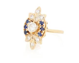 1108
An 14K Gold, Diamond, Colorless Stone and Sapphire Ring
Centering a colorless stone weighing approximately 0.61 carat, accented by round diamonds and sapphire
Size: 7 1/4
5.8 grams gross
Estimate: $300 - $500