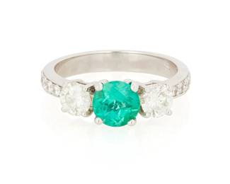 1050
An 18K White Gold, Emerald and Diamond Ring
Centering a round emerald weighing approximately 1.00 carat, accented by fourteen round diamonds weighing approximately 0.98 carat
Size: 7 1/2
5.0 grams gross
Estimate: $1,000 - $2,000