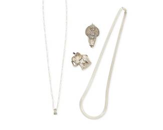 1077
A Group of Sterling Silver Jewelry
Comprising two repoussé sterling silver hollow silver pendants, one an elephant, and one an angel, together with two sterling silver chains, one a flat snake chain, and one a narrow paper clip chain, one marked for sterling
4 pieces
Pendants: 2 3/4 in. & 2 in.; Chains: 29 in. & 25 in.
55.6 grams
Estimate: $200 - $300