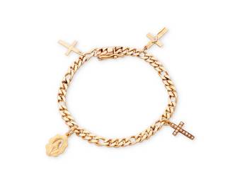 1007
A Gold Charm Bracelet
A 14k gold curb link bracelet suspending 14k and 10k gold cross and Mother Mary charms
Length: 6 3/4 in.
12.5 grams gross
Estimate: $500 - $700