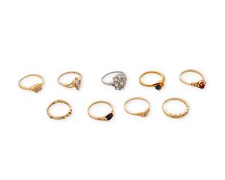 1149
A Group of Gold and Gem-Set Rings
Including six 14k gold rings, two 18k gold rings and one platinum ring
nine pieces
Sizes: 8 - 8 3/4
24.7 grams gross
9 Pieces
Estimate: $800 - $1,200