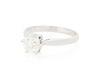 1171
An 18K White Gold and Diamond Ring
Centering an old mine-cut diamond weighing approximately 1.07 carats
Size: 6 3/4
3.3 grams gross
Estimate: $1,200 - $1,500