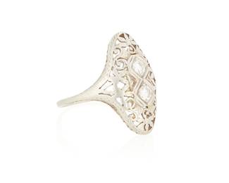 1159
A 18K White Gold and Diamond Ring
Of an ornate filigree design centering two round diamonds
Size: 8
3.5 grams gross
Estimate: $400 - $600
