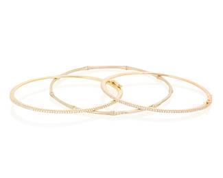 1012
A Group of Three 18K Bi-Color Gold and Diamond Bangles
Featuring two oval hinged bangles of 18k yellow and rose gold accented by round diamonds, signed Bony Levy, together with a round 18k gold bangle of a bamboo design accented by round diamonds
3 pieces
Measures: 6 1/2 and 8 in.
23.4 grams gross
Estimate: $600 - $800