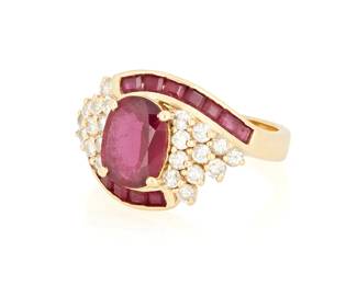 1151
A14K Gold, Ruby and Diamond Ring
Centering an oval ruby weighing approximately 1.91 carats accented by round diamonds and channel set rubies,
Size:8 1/2
6.8 grams gross
Estimate: $1,500 - $2,500