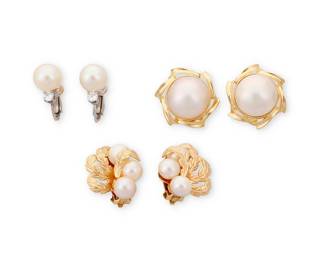 1129
Three Pairs of Gold and Cultured Pearl Ear Clips
Including a pair of 14k white gold and single cultured pearl earrings accented by two round diamonds, a pair of 14k gold and mabe pearl ear clips and a pair of 14k gold leaf motif and round cultured pearl ear clips
6 pieces
Measures: 5/8 - 7/8 in.
23.2 grams gross
Estimate: $1,000 - $2,000