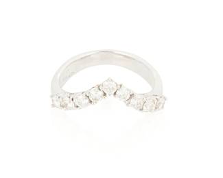 1170
An 18K White Gold and Diamond Ring
Of a chevron design featuring nine round diamonds weighing approximately 0.63 carat
Size: 7
3.7 grams gross
Estimate: $400 - $600