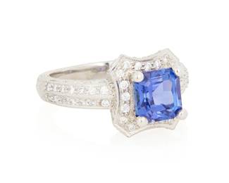 1022
A Platinum, Tanzanite and Diamond Ring
Centering a square emerald-cut tanzanite weighing approximately 2.40 carats, accented by round diamonds weighing approximately 0.57 carats in an engraved shank
Size: 8
11.8 grams gross
Estimate: $600 - $800