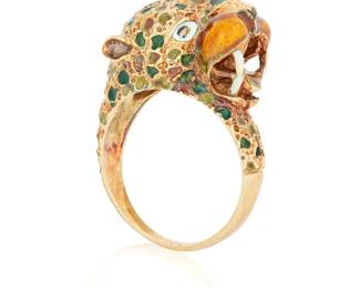 1152
A Gold and Enamel Ring
Of a leopard design featuring green, orange and white enamel
Size: 7 3/4
8.7 grams gross
Estimate: $500 - $700