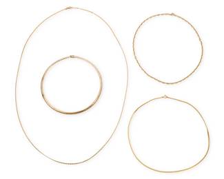 1148
A Group of Four Gold Chains
Including four chains of various link designs
4 pieces
Lengths: 15 1/2 in., 20 1/2 in., 20 1/2 in., and 38 in.
69.3 grams gross
Estimate: $2,000 - $3,000