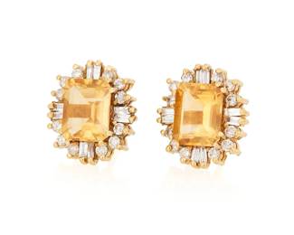 1004
A Pair of 14K Gold, Citrine and Diamond Earrings
Centering two emerald-cut citrines accented by round and tapered baguette diamonds
2 pieces
Measures: 5/8 x 1/2 in.
7.6 grams gross
Estimate: $400 - $600