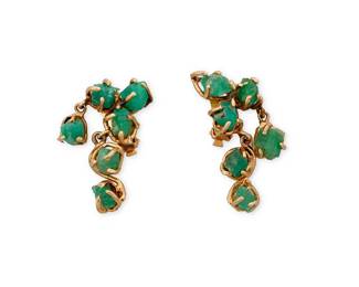 1122
A Pair of 14K Gold and Emerald Ear Clips
Featuring emerald rough set in an organic gold design
2 pieces
Measures: 1 3/4 x 1 in.
20.7 grams gross
Estimate: $600 - $800