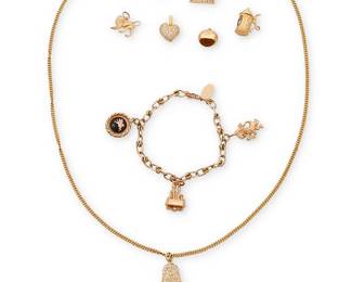 1014
A Group of Gold Jewelry
Including a necklace suspending five charms, a bracelet suspending three charms and six loose charms
7 pieces
Necklace: 24 in., Bracelet: 7 in.
57.2 grams
Estimate: $1,500 - $2,500
