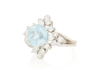 1157
A 14K White Gold, Aquamarine and Diamond Ring
Centering a round aquamarine weighing approximately 3.50 carats, accented by round diamonds weighing approximately 1.00 carat
Size: 5 1/2
7.2 grams gross
Estimate: $800 - $1,200