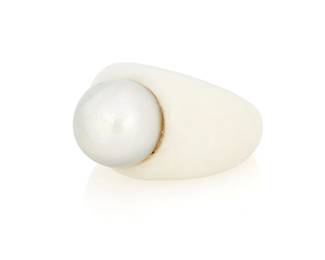 1036
A Platinum, White Agate and Colored Cultured Pearl Ring
Centering a grey cultured pearl measuring approximately 12.45 mm, set in a carved white agate setting
Size: 6
14.2 grams gross
Estimate: $300 - $500