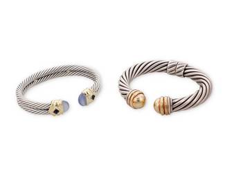 1057
David Yurman: Two Silver, Gold and Gem-Set Cuffs
Including a chunky sterling and 14k gold twisted wire hinged cuff, together with a sterling silver, 14k gold twisted two-wire cuff, with iolite gemstones and chalcedony terminals, each signed D. Yurman
2 pieces
Larger: 6 3/8 in., gap: 1/2 in.; Smaller: 6 in., gap: 1/4 in. (hinged)
88.4 grams gross
Estimate: $800 - $1,200