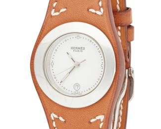 1186
Hermès: A Stainless Steel and Leather Watch
Dial:20.0 mm, round with dot indices
Case:30.0 mm
Case number: 1655979
Closure: brown leather strap with deployment clasp
Signed:dial, case, strap and clasp
Inner circumference:6 1/2-7 in.
35.0 grams gross
Estimate: $700 - $900
