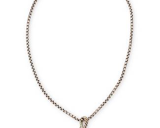 1056
David Yurman: A Sterling Silver and Diamond Necklace
A fancy link chain suspending a modified square pendant set with pave diamonds weighing approximately 1.00 carats, signed D.Y.
Length: 15 in., Pendant: 1 1/2 x 3/4 in.
18.2 grams gross
Estimate: $600 - $800