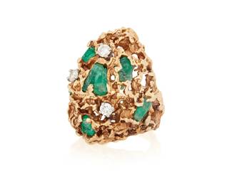 1121
A 14K Gold, Emerald and Diamond Ring
Featuring an organic textured gold set with various shapes of rough emerald and accented by round diamonds
Size: 4
15.1 grams gross
Estimate: $800 - $1,200